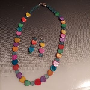 Luscious mother of pearl heart necklace matching earrings